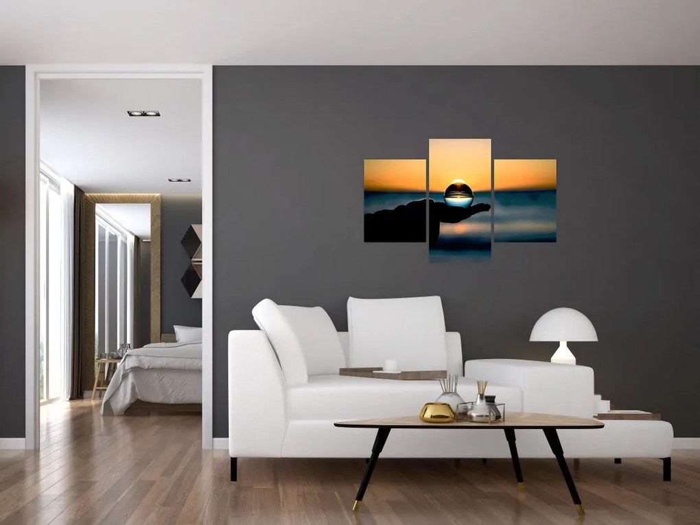 Tabloul cu bilă din sticlă în palmă (90x60 cm)