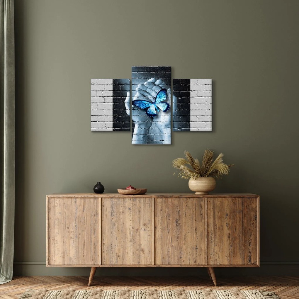 Tablou cu flutere albastru pe perete (90x60 cm)