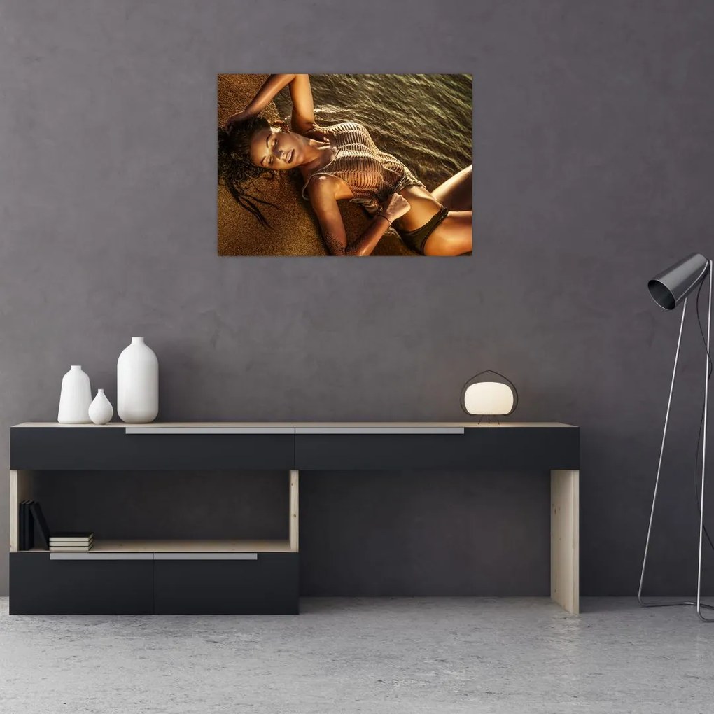 Tablou cu femeia întinsă pe plajă (70x50 cm)