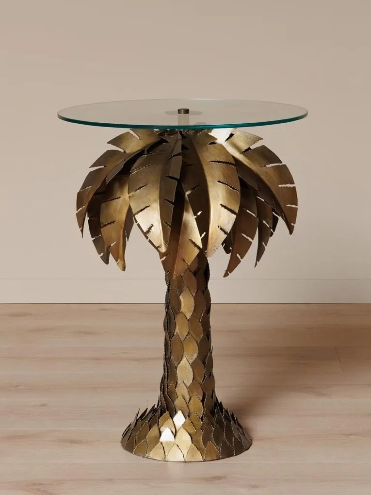 Măsuță laterală înaltă din metal, auriu, cu blat rotund din sticlă și bază în formă de palmier, finisaj antichizat, 73 x 53 cm, „Palm”