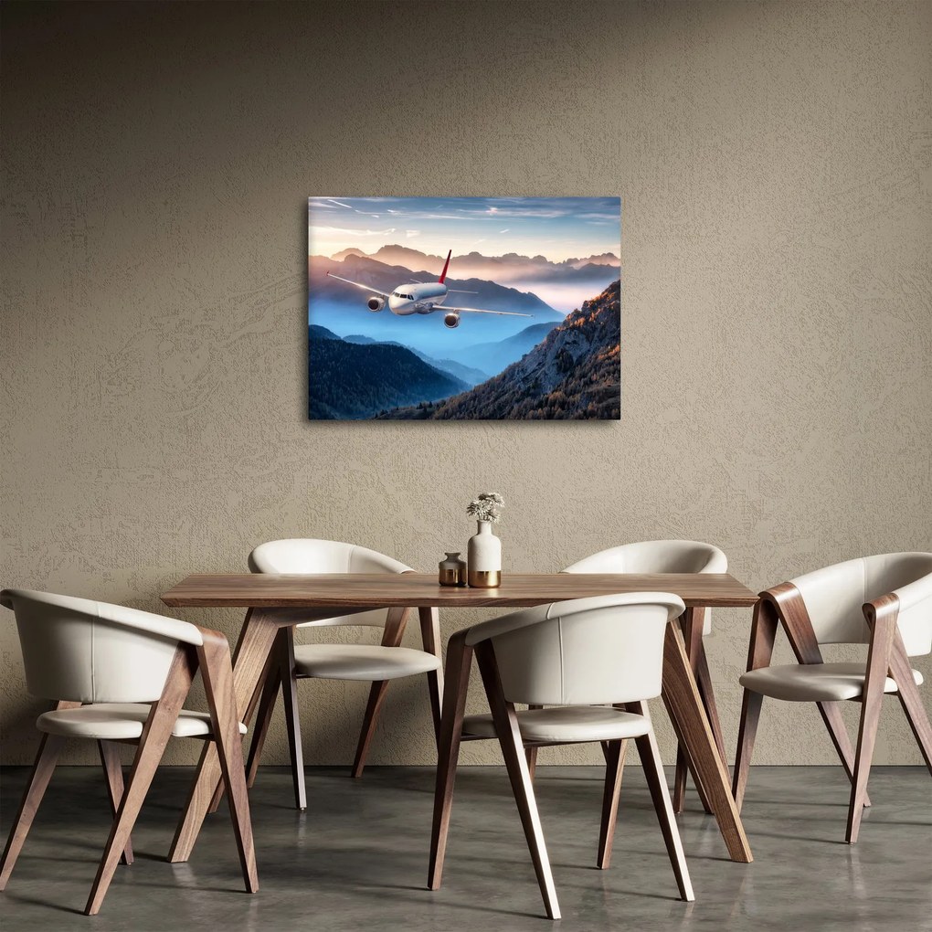 Tablou - Avion peste crestele montane (70x50 cm)