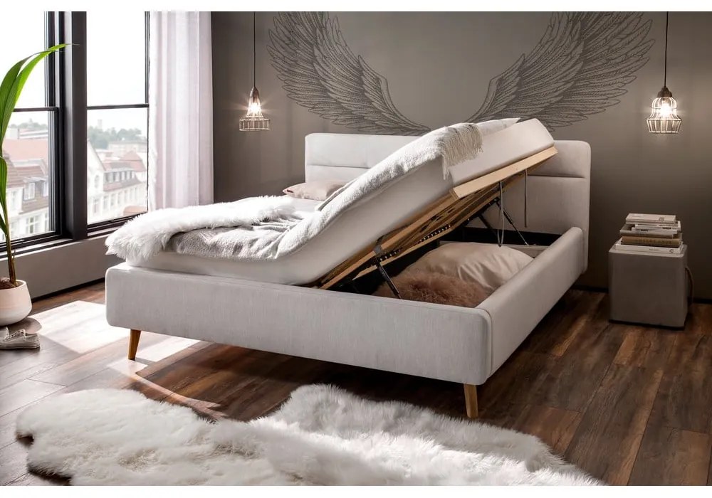 Pat matrimonial gri deschis tapițat cu spațiu de depozitare cu somieră 180x200 cm Lotte – Meise Möbel