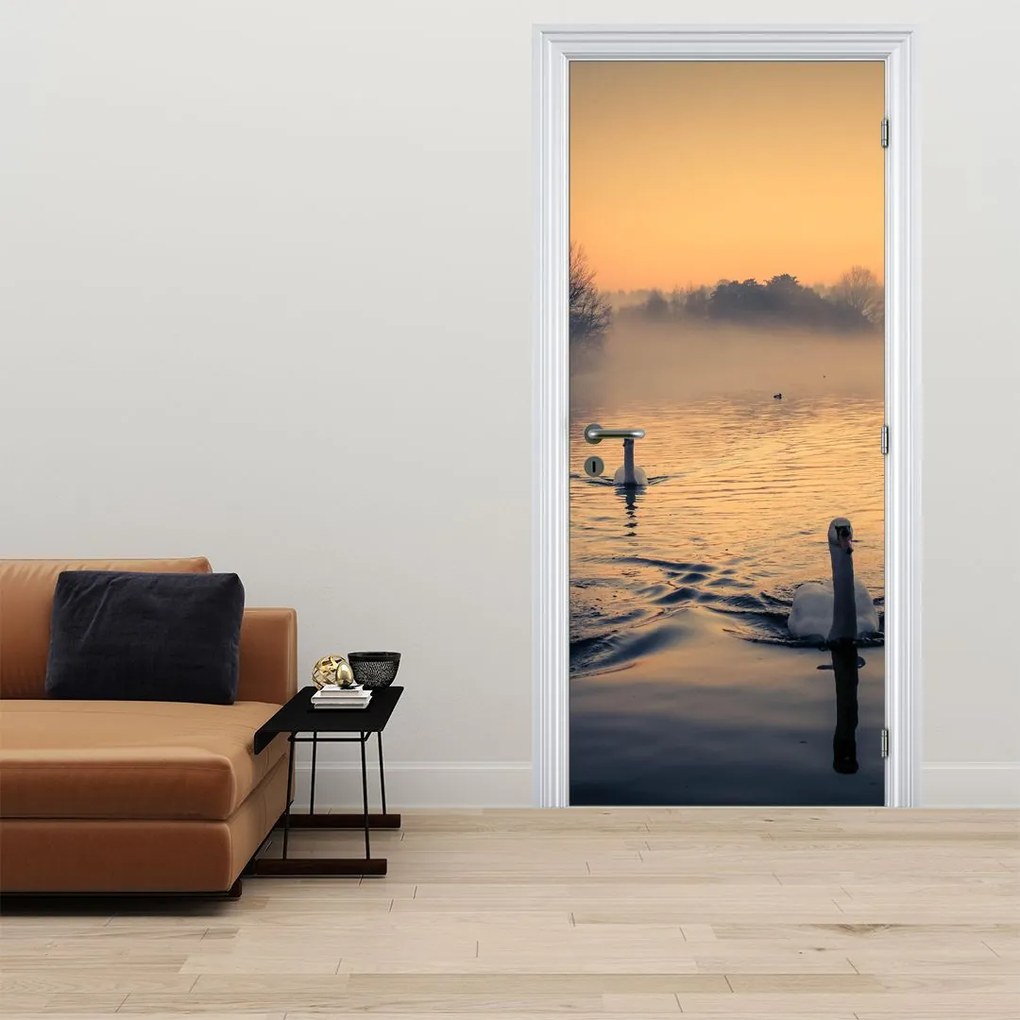 Fototapet pentru ușă - Lebede pe apă în ceață (95x205cm)