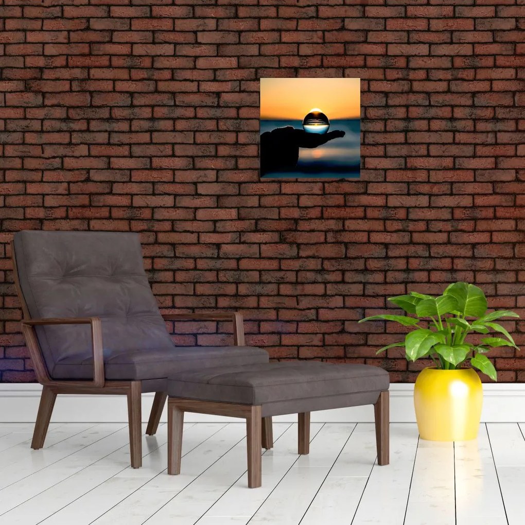 Tabloul cu bilă din sticlă în palmă (30x30 cm)