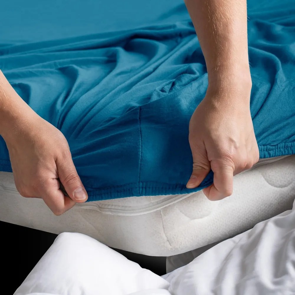 Cearceaf petrol din jerseu cu elastic 90x200 cm Amber – Restilo