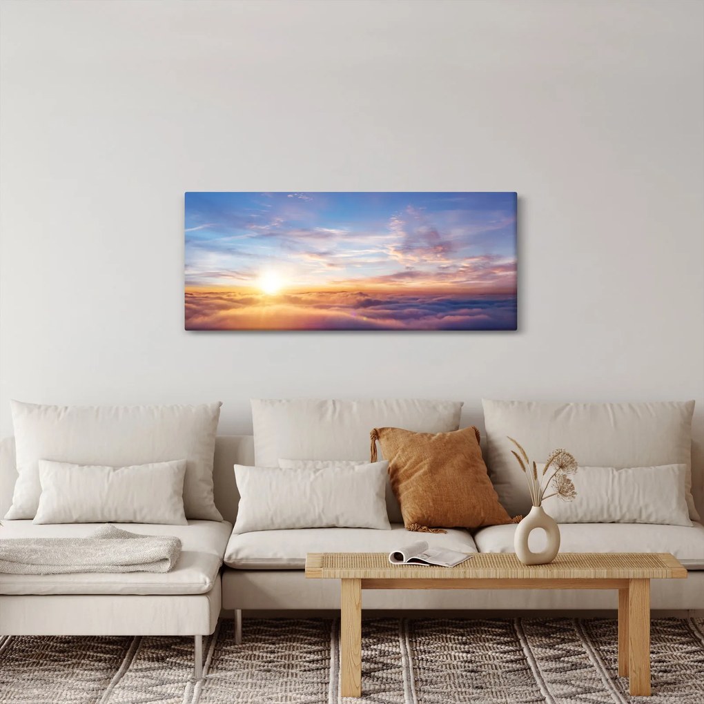 Tablou - Apus de soare deasupra norilor (120x50 cm)