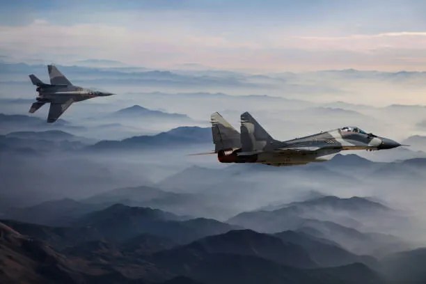 Fotografie Mig-29 Fighter Jets in Flight above, guvendemir