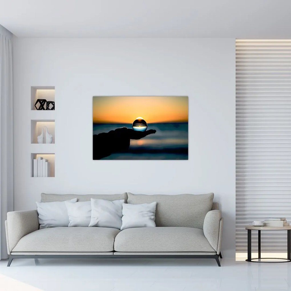 Tabloul cu bilă din sticlă în palmă (90x60 cm)