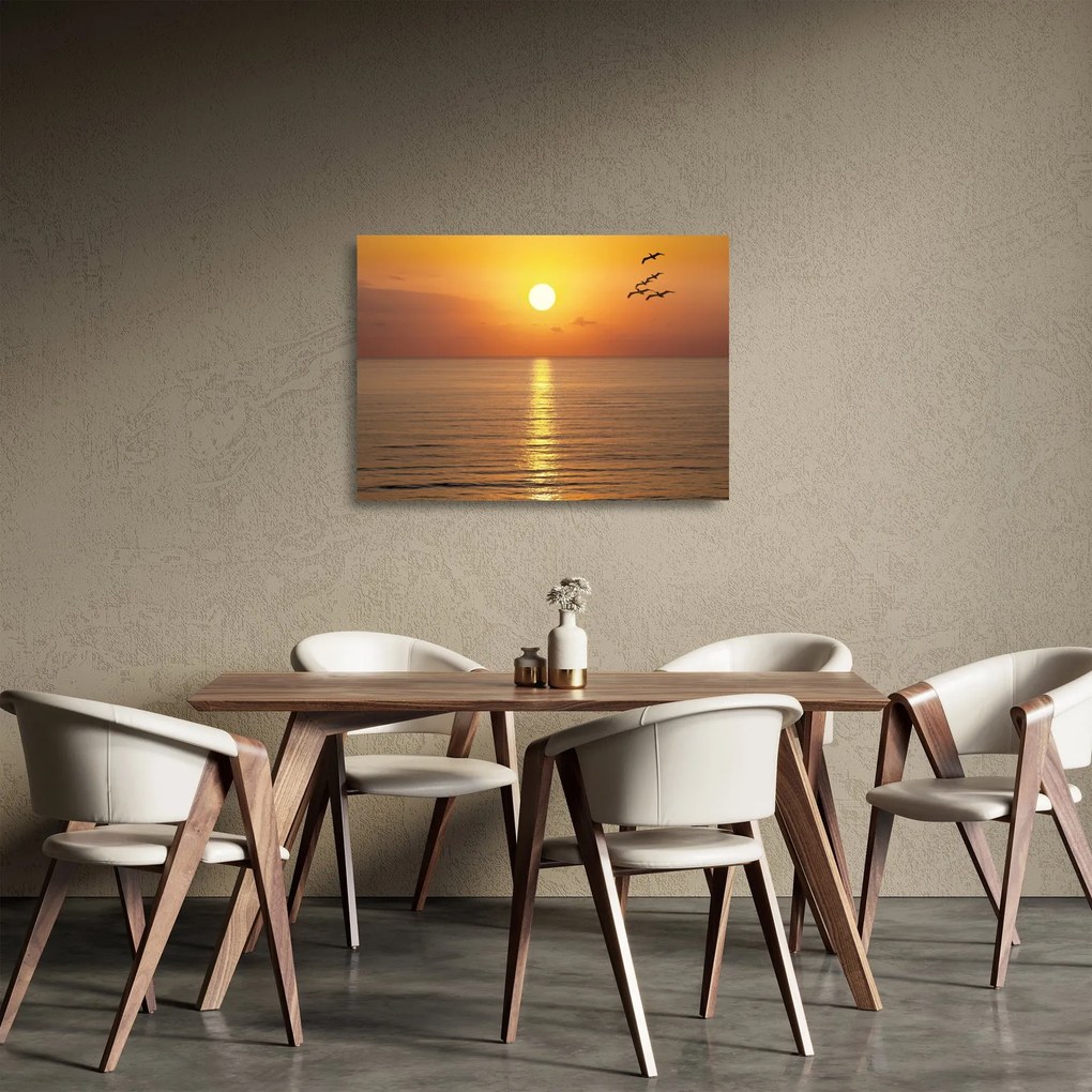 Tablou pe sticlă - Apus de soare peste ocean (70x50 cm)