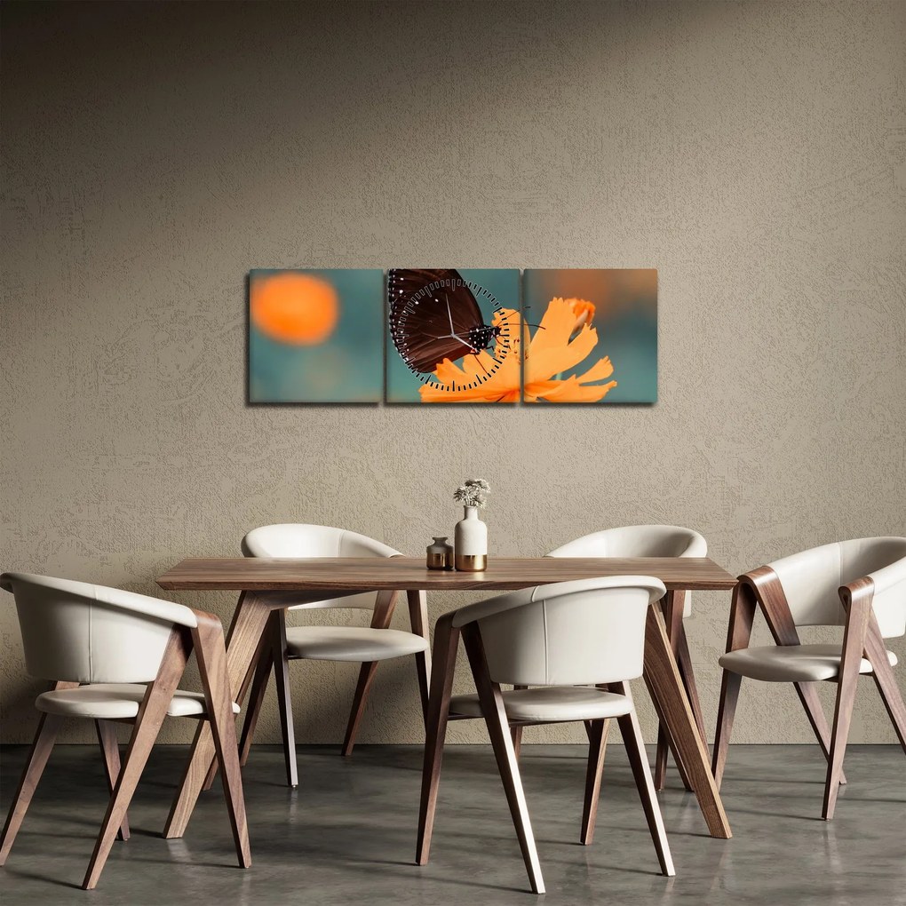 Tablou - fluture pe o floare portocalie (cu ceas) (90x30 cm)