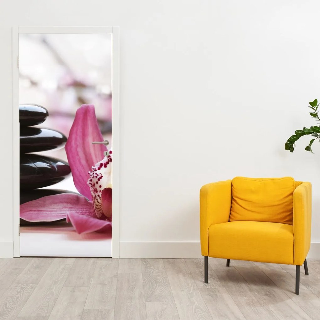 Fototapet pentru ușă - Pietre pentru masaj și orhideele (95x205cm)