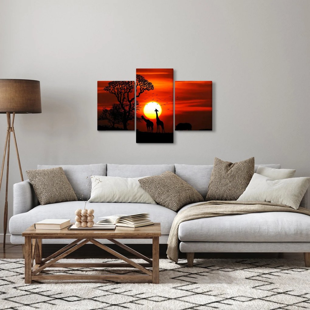 Tablou - Siluete animalelor la apus de soare (90x60 cm)
