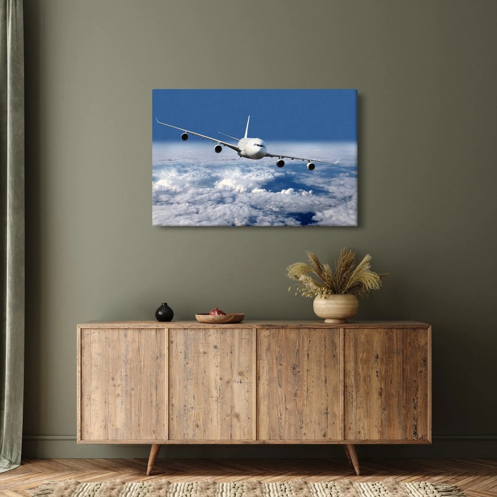 Tablou - Avion în nori (90x60 cm)