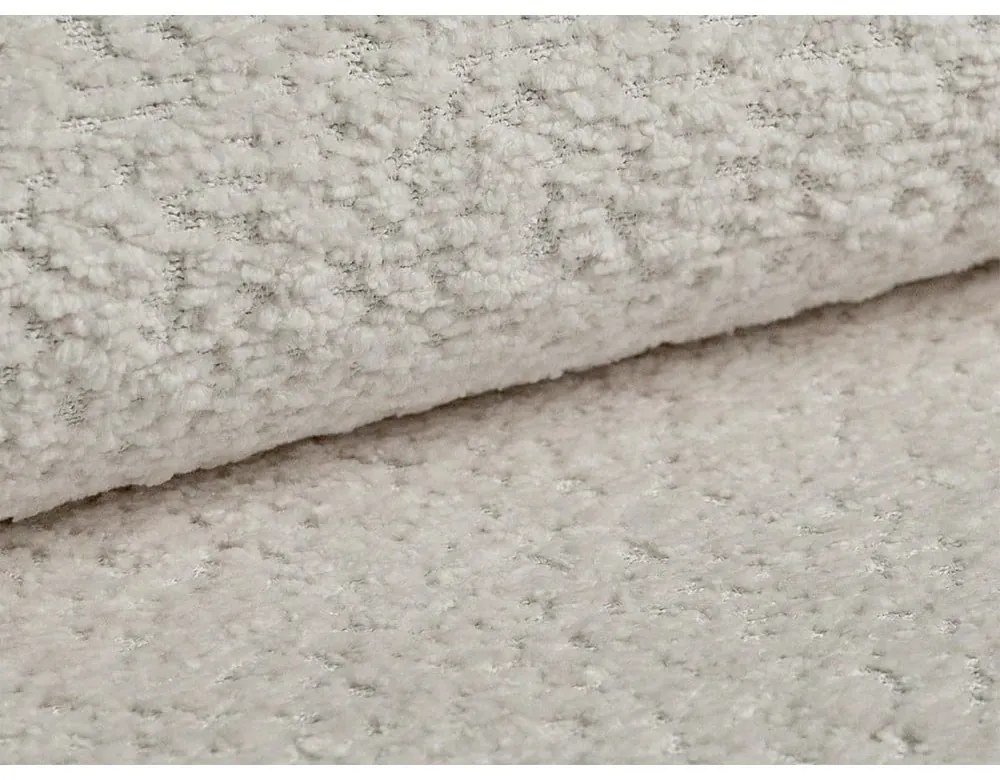 Canapea bej extensibilă cu tapițerie din țesătură bouclé 206 cm Kemi – Cosmopolitan Design