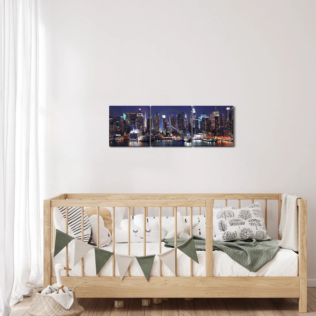 Tablou - Zgârie-nori din New York iluminate (cu ceas) (90x30 cm)
