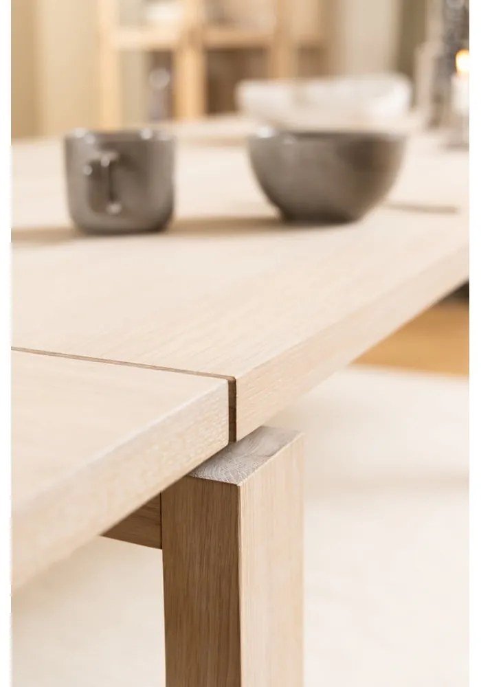 Masă de dining extensibilă cu blat cu aspect de lemn de stejar 100x200 cm Linley – Actona