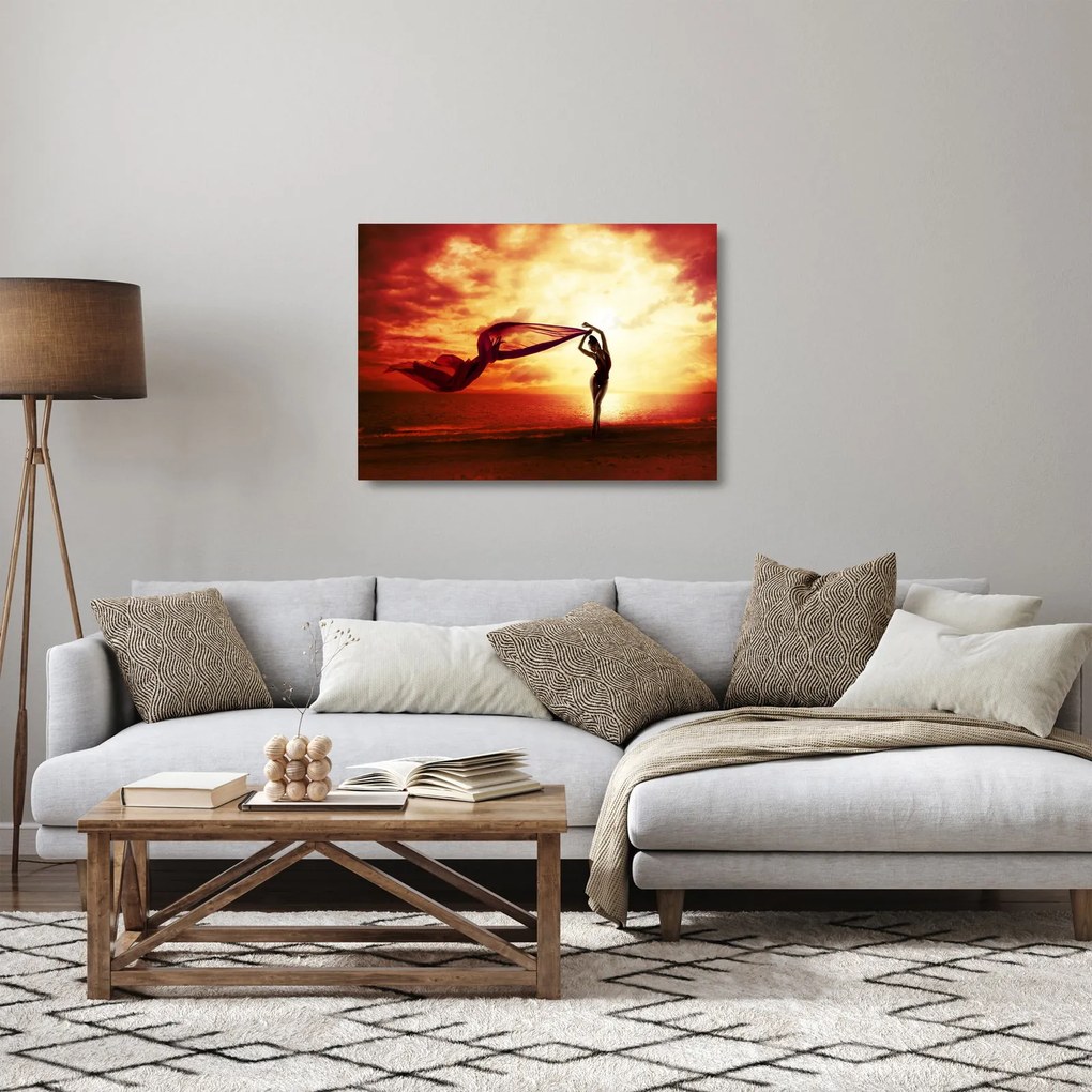 Tablou pe sticlă - Silueta femeii la apus de soare (70x50 cm)