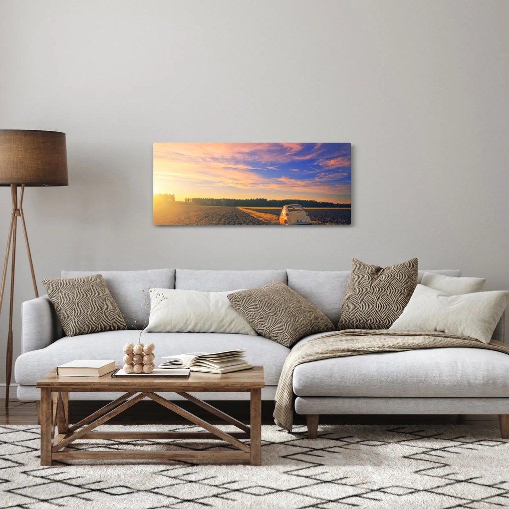 Tablou - Mașină galbenă ăn câmp (120x50 cm)