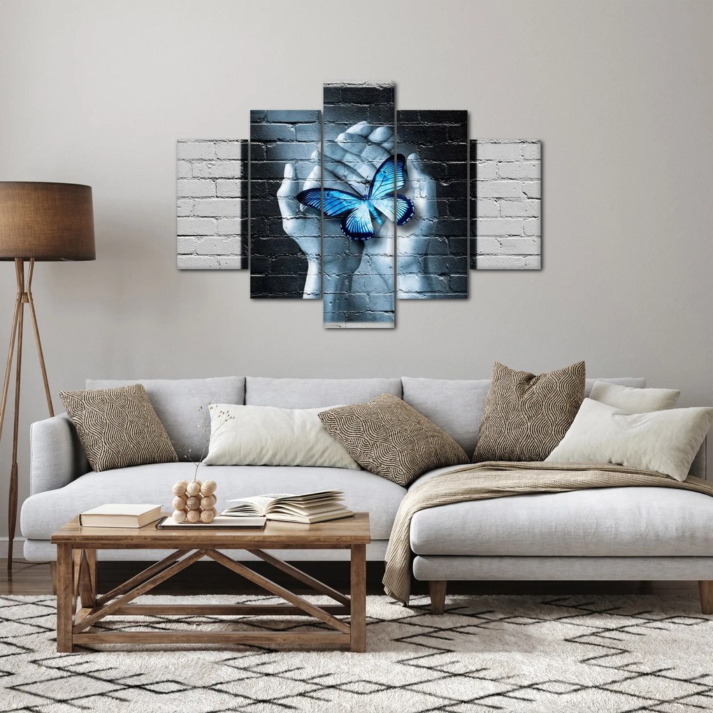 Tablou cu flutere albastru pe perete (150x105 cm)