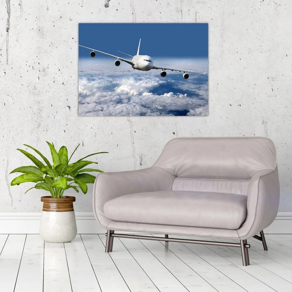Tablou pe sticlă - Avion în nori (70x50 cm)
