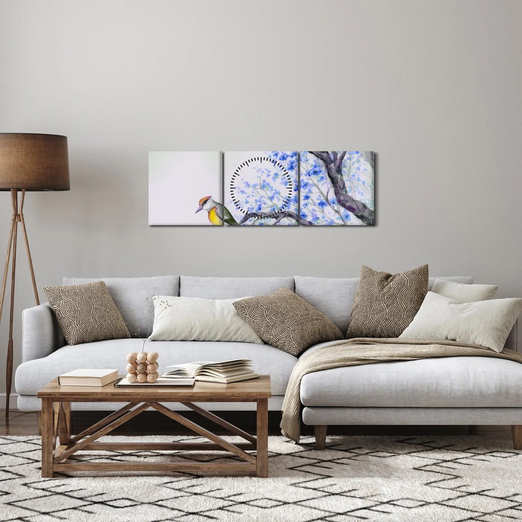 Tablou - Pasăre pe un copac cu flori albastre (cu ceas) (90x30 cm)