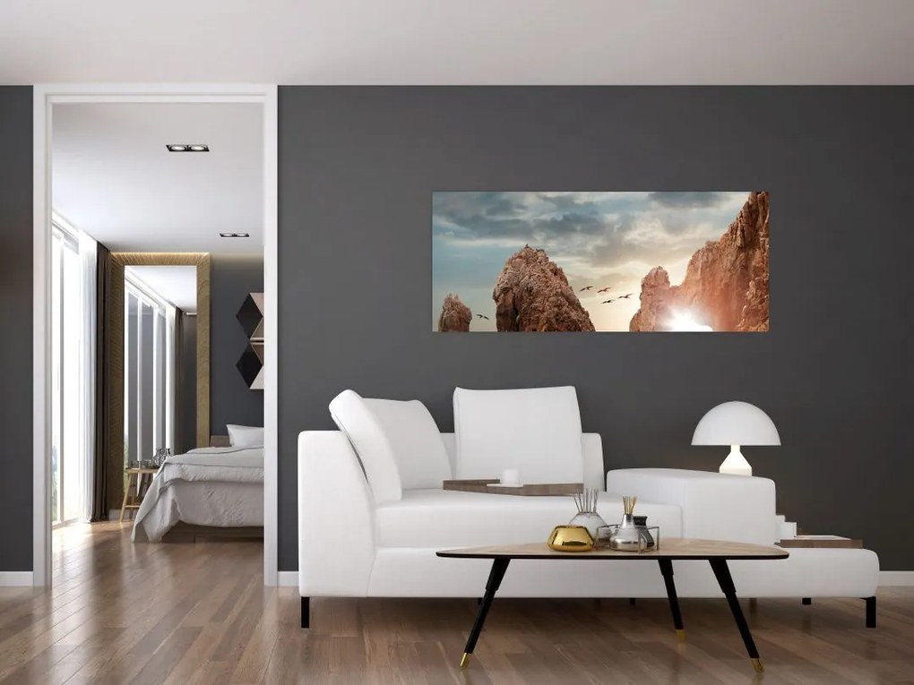 Tablou - Apus de soare peste stânci (120x50 cm)