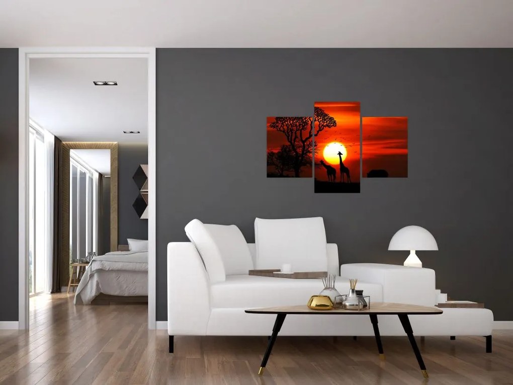 Tablou - Siluete animalelor la apus de soare (90x60 cm)