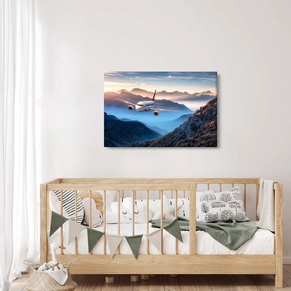 Tablou - Avion peste crestele montane (90x60 cm)