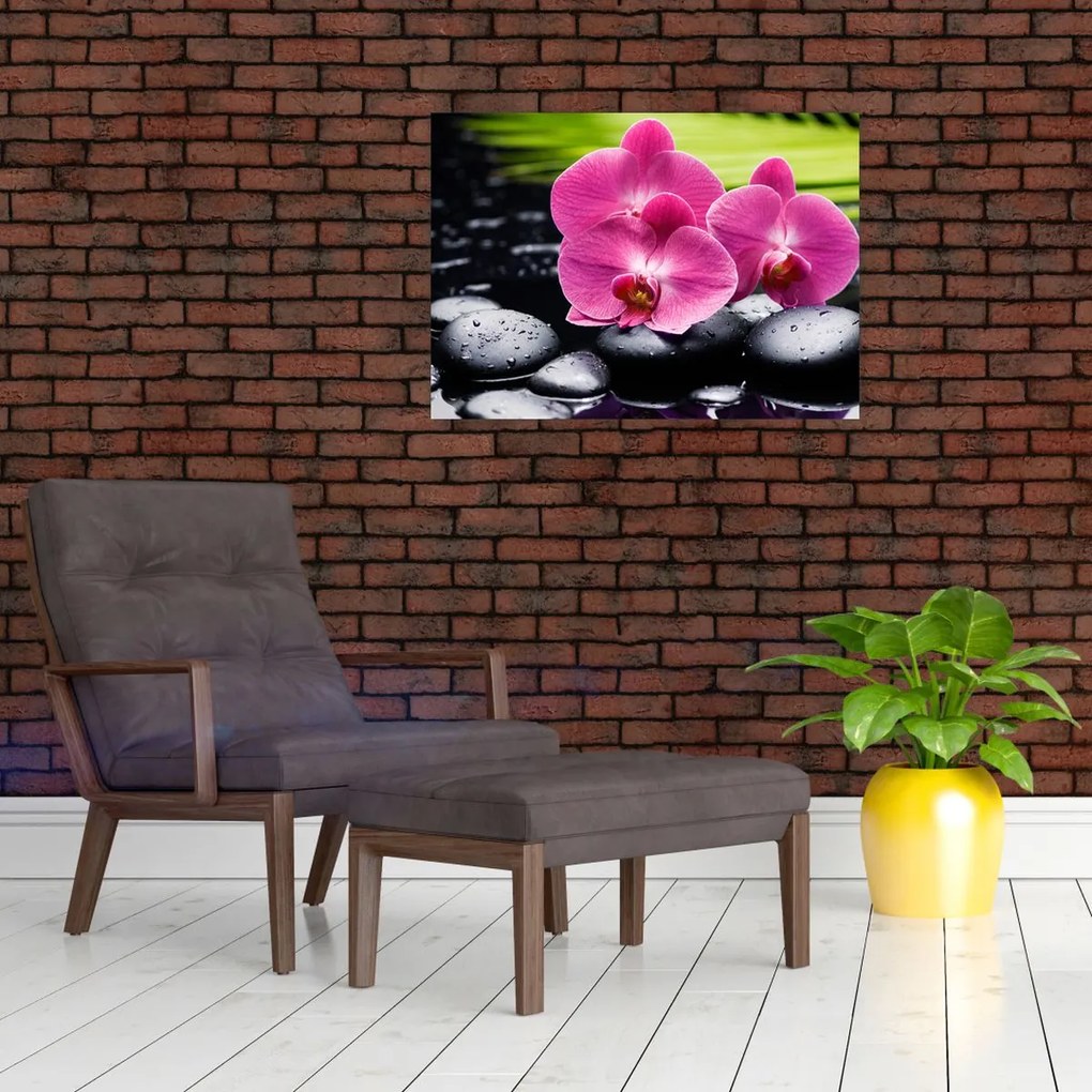 Tablou pe sticlă - Orhidee roz cu frunze de palmier (70x50 cm)