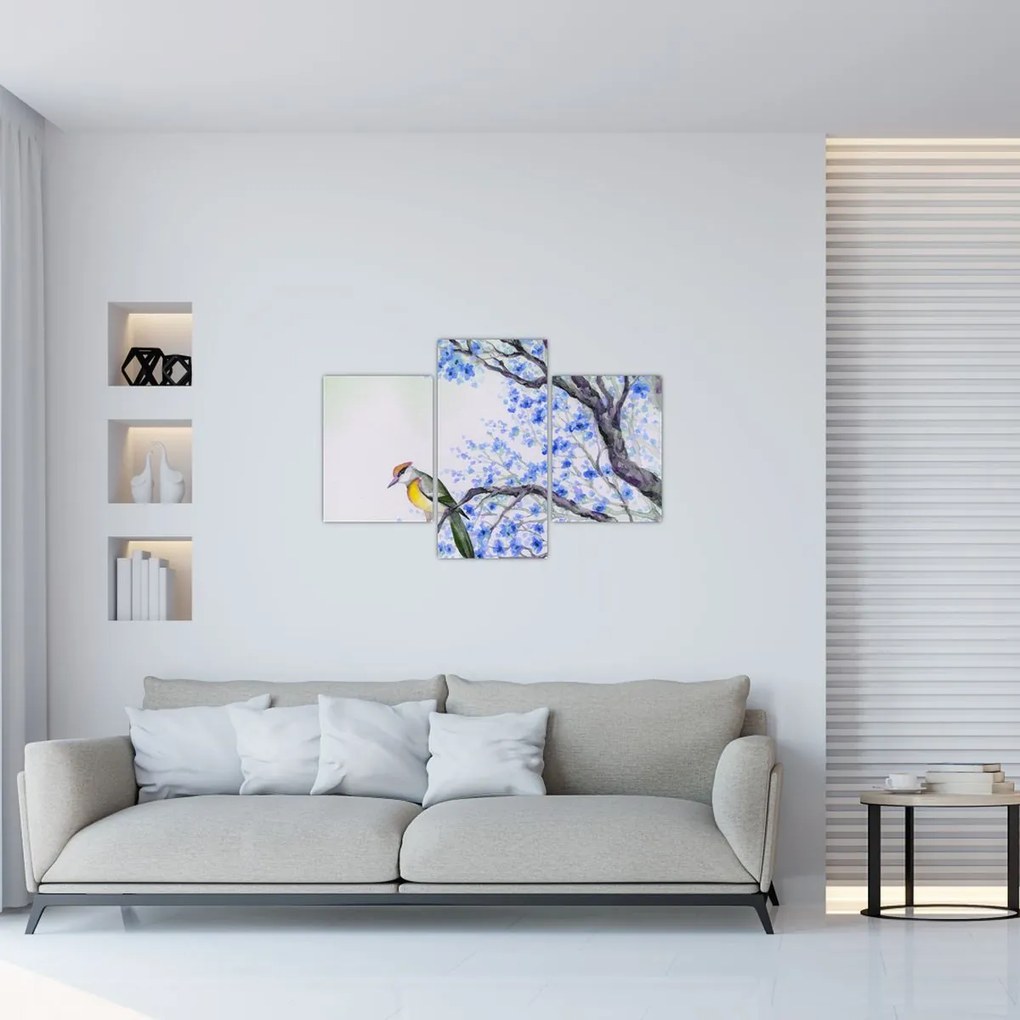 Tablou - Pasăre pe un copac cu flori albastre (90x60 cm)