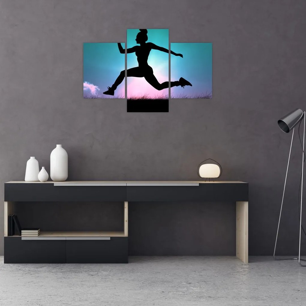 Tablou cu silueta feminină sărind (90x60 cm)