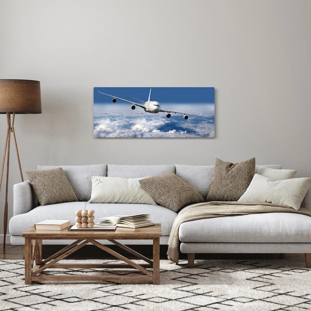 Tablou - Avion în nori (120x50 cm)