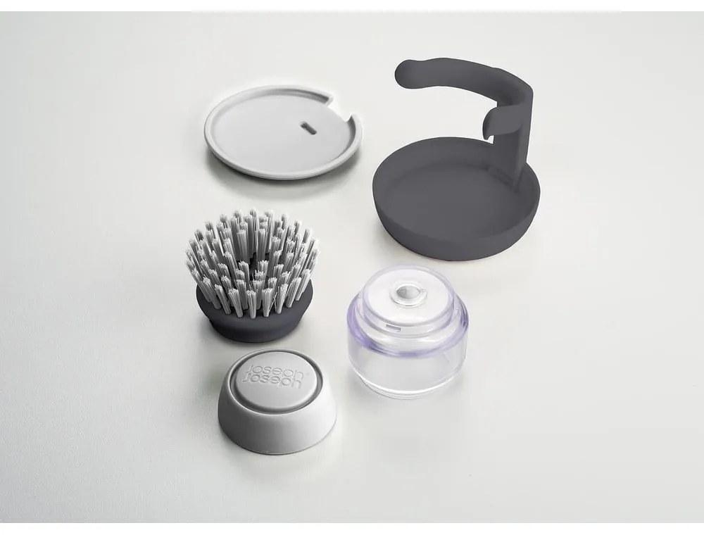Perie cu dozator și suport Joseph Joseph Palm Scrub, gri