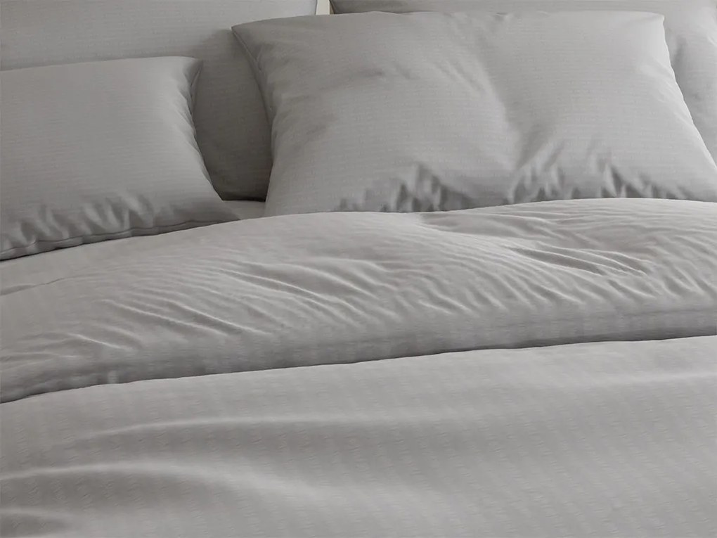 Lenjerie de pat din bumbac cu finisaj creponat LUXERA gri deschis buzunar hotel II.calitate Dimensiune lenjerie de pat: 70 x 90 cm | 140 x 200 cm