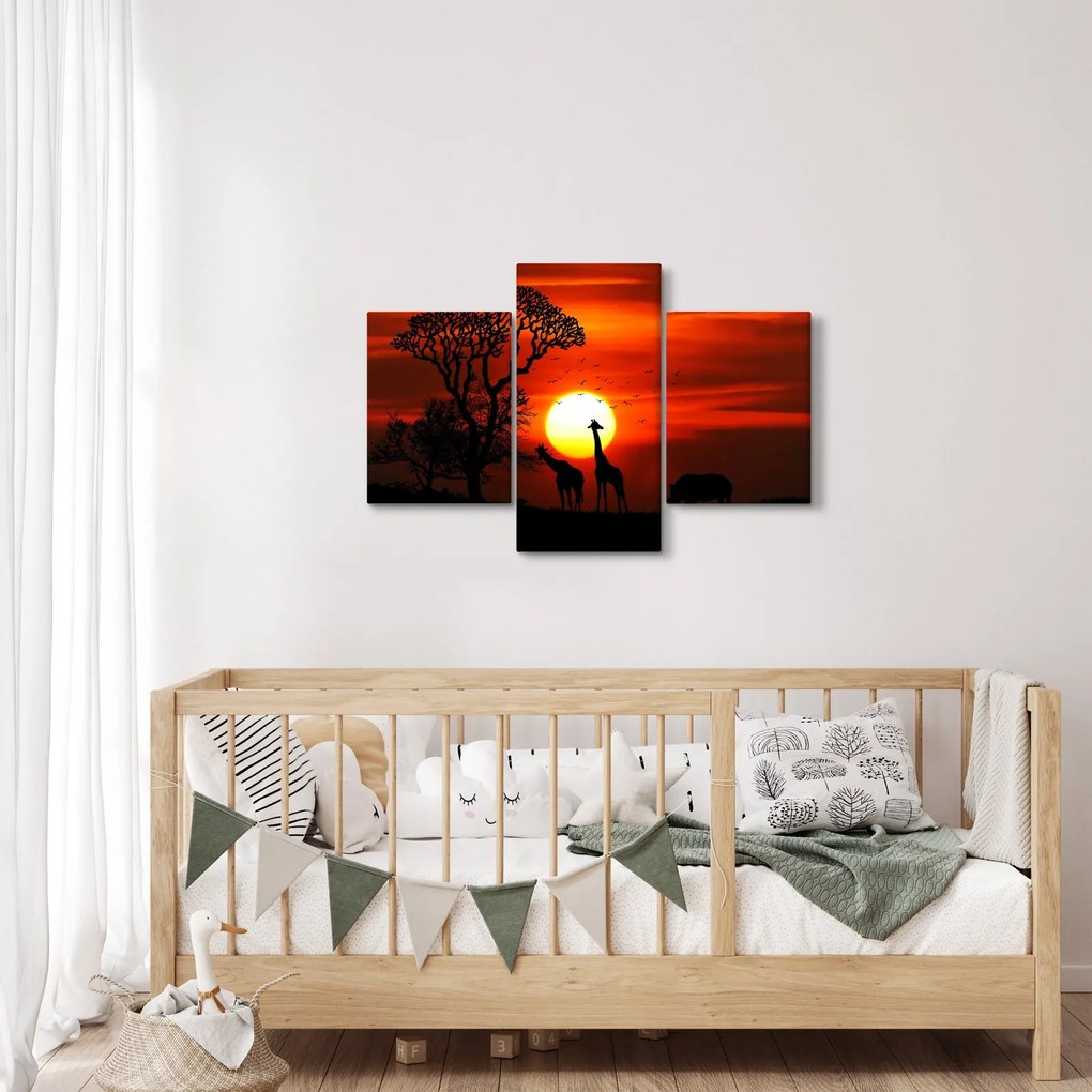 Tablou - Siluete animalelor la apus de soare (90x60 cm)