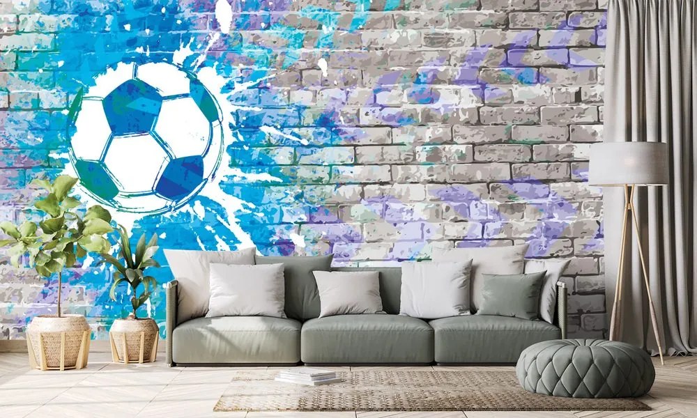 Tapet minge de fotbal albastră pe perete de cărămidă
