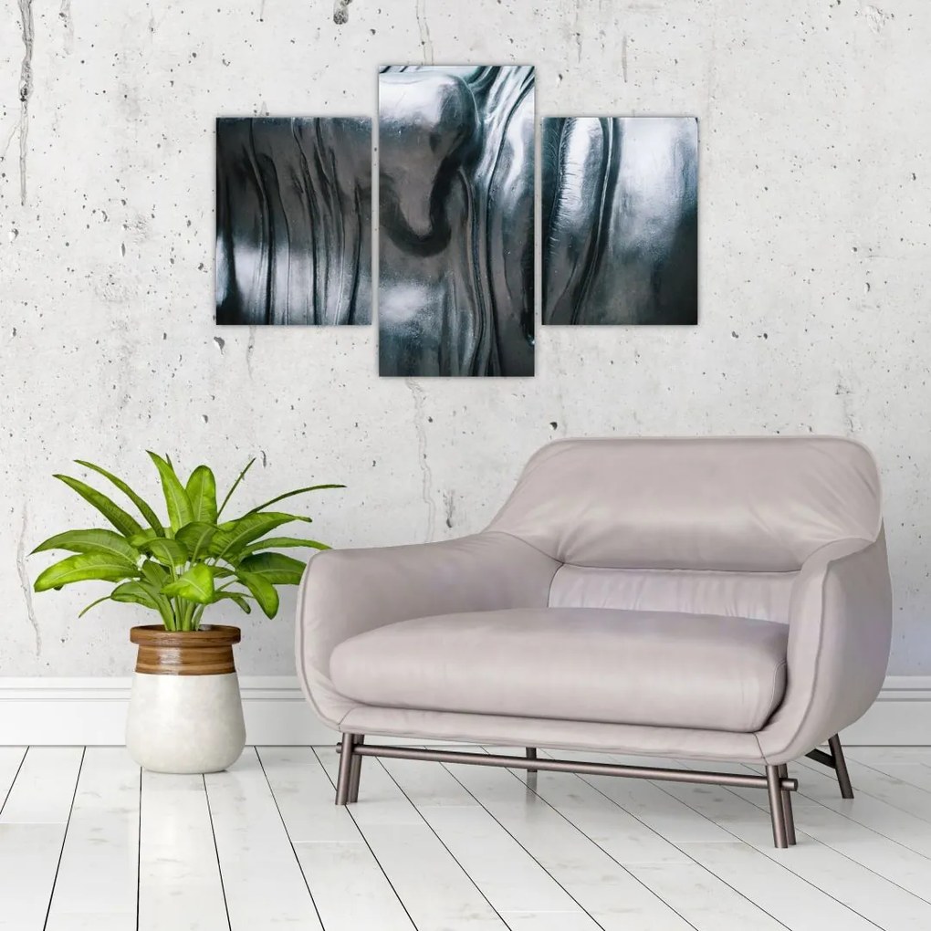 Tablou - Fața din oțel (90x60 cm)