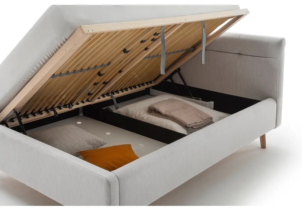 Pat matrimonial gri deschis tapițat cu spațiu de depozitare cu somieră 140x200 cm Lotte – Meise Möbel
