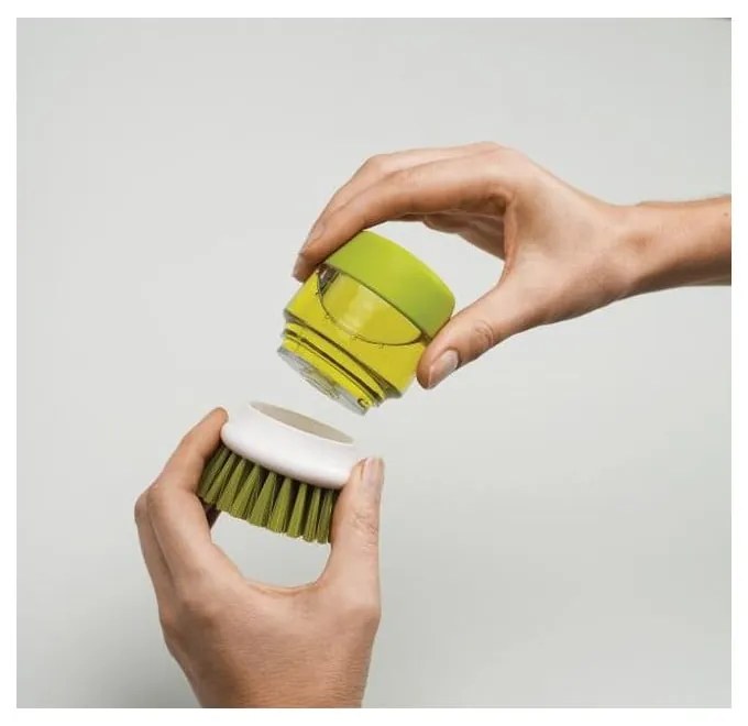 Perie cu dozator și suport Joseph Joseph Palm Scrub, verde