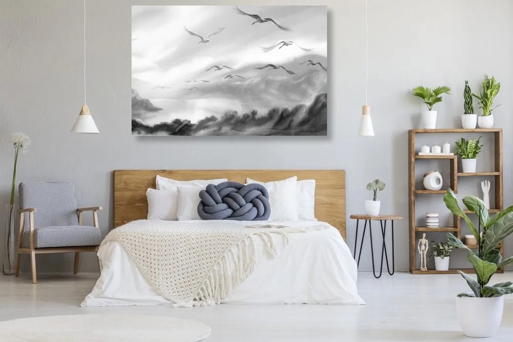 Tablou zborul păsărilor deasupra peisajului în design alb-negru