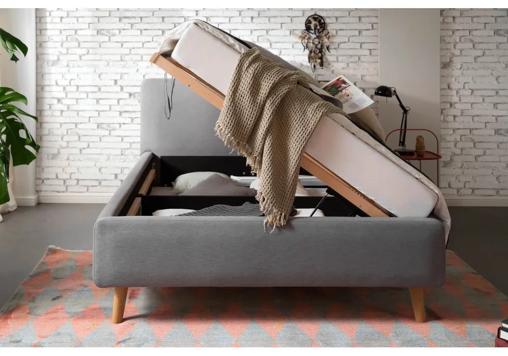 Pat matrimonial gri tapițat cu spațiu de depozitare cu somieră 140x200 cm Mattis – Meise Möbel