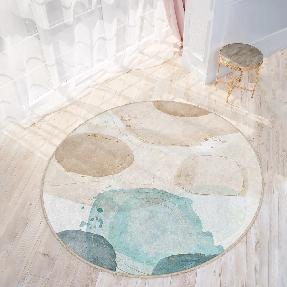 Covor albastru/bej lavabil rotund ø 150 cm Puddle – Mila Home
