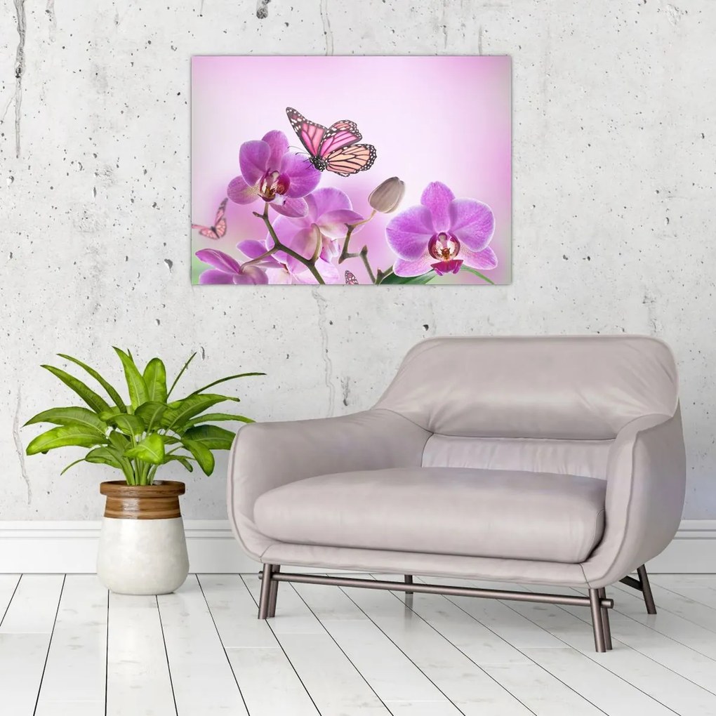 Tablou pe sticlă - Fluture pe flori de orhidee, liliac (70x50 cm)
