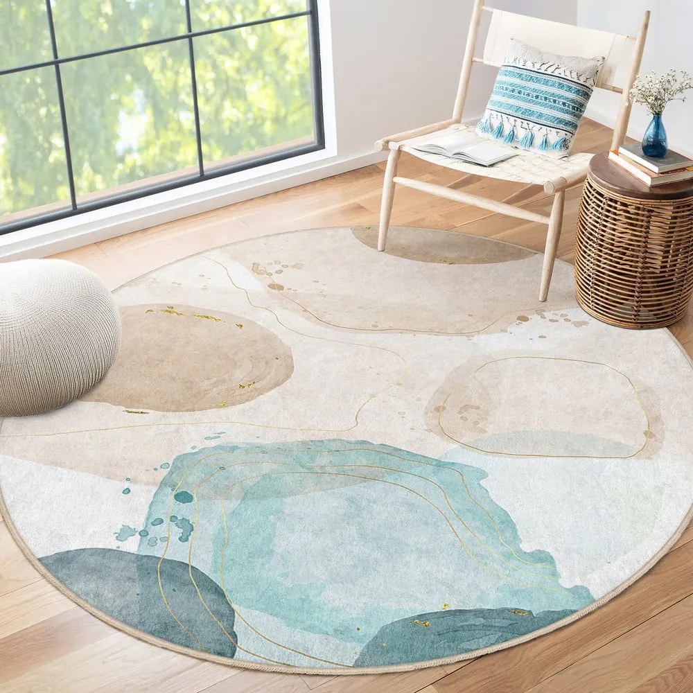 Covor albastru/bej lavabil rotund ø 150 cm Puddle – Mila Home