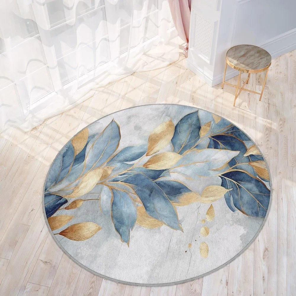 Covor albastru/auriu lavabil rotund ø 120 cm Golden Leaves – Mila Home