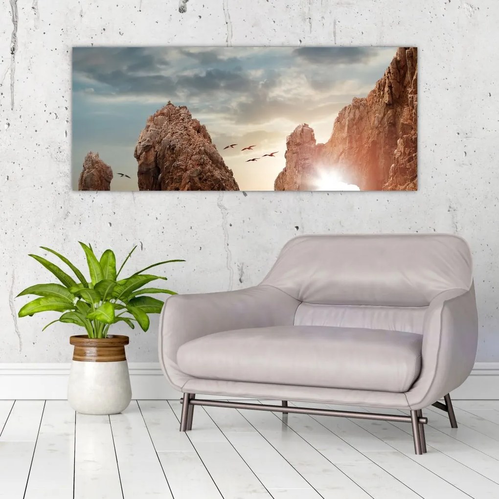 Tablou - Apus de soare peste stânci (120x50 cm)