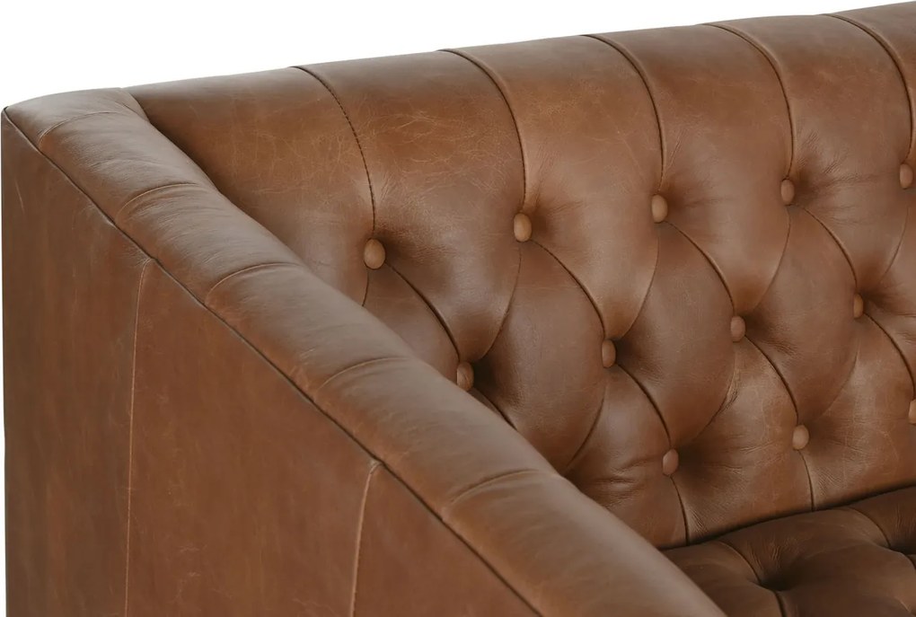 Canapea 3 locuri din piele cognac, cu spătar capitonat, picioare din metal auriu, aspect retro, 74 x 209 x 77 cm, „Odette”
