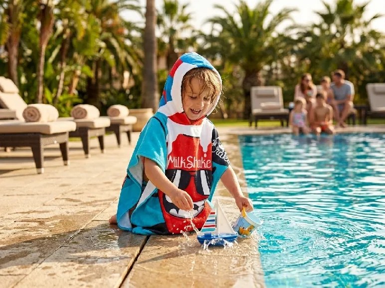 Poncho pentru copii MILKSHAKE albastru Dimensiune: 60 x 120 cm