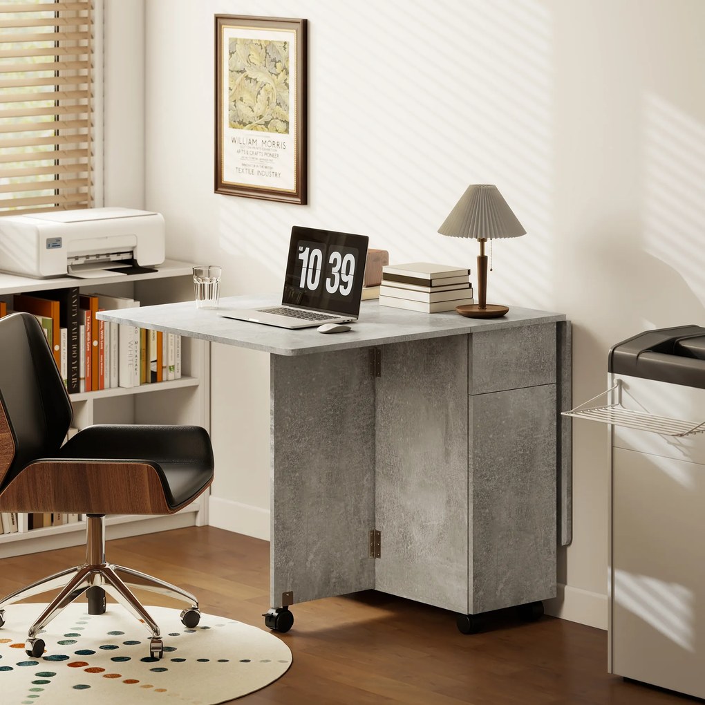 HOMCOM Masă de Luat Masa Pliabilă, Masă de Bucătărie cu Blaturi Rabatabile și Roți cu Frâne pentru 6 Persoane, Birou Compact cu 2 Sertare, 2 Uși și Dulap, pentru Living, 140x76x74î cm, Gri Ciment | Aosom Romania