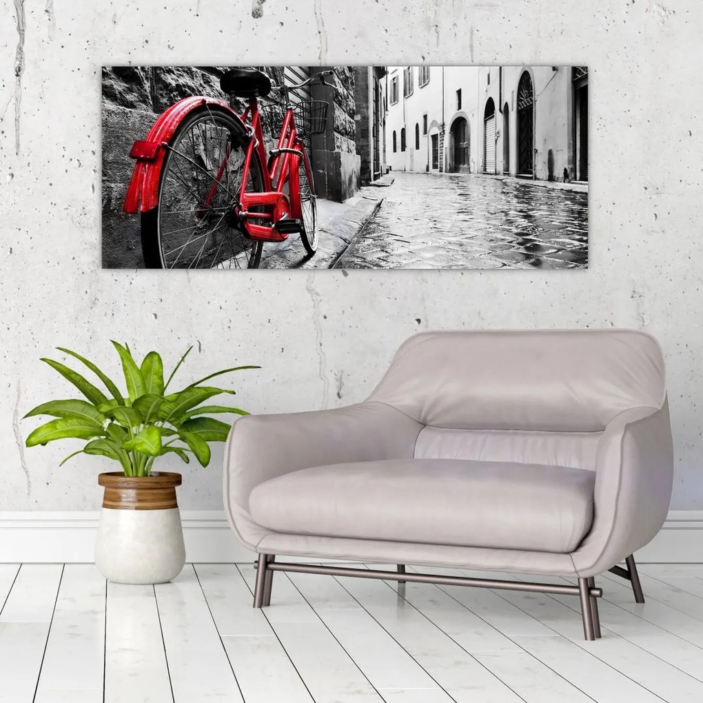 Tablou - Bicicleta roșie pe o stradă pavată (120x50 cm)